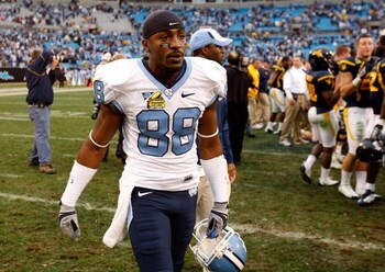 CHARLOTTE, NC - DECEMBER 27:  Hakeem Nicks #88 of the North Carolina Tar Heels walks off the field after a 31-30 defeat to the West Virginia Mountaineers during the Meineke Car Care Bowl on December 27, 2008 at Bank of America Stadium in Charlotte, North 