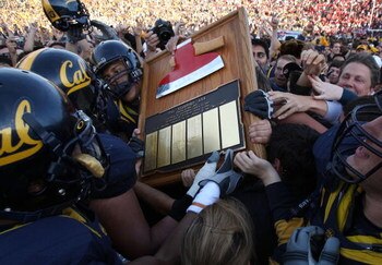BERKELEY, CA - NOVEMBER 22:  Members of the California Golden Bears run with 'The Axe' after defeating the Stanford Cardinal during an NCAA football game on November 22, 2008 at Memorial Stadium in Berkeley, California.  (Photo by Jed Jacobsohn/Getty Imag