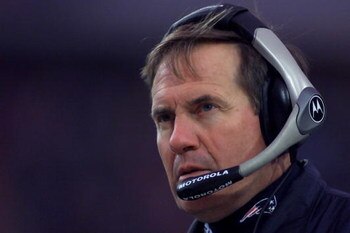 16 Dec 2001:  Head coach Bill Belicheck of the New England Patriots observes a meeting of officials during their game against the Buffalo Bills at Ralph Wilson Stadium in Orchard Park, New York.  The New England Patriots won the game in overtime 12-9.  DI