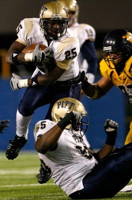 MORGANTOWN, WV - DECEMBER 1:  Running back LeSean McCoy #25 of the Pittsburgh Panthers rushes upfield against the West Virginia Mountaineers during the second half at Milan Puskar Stadium December 1, 2007 in Morgantown, West Virginia.  Pittsburgh defeated