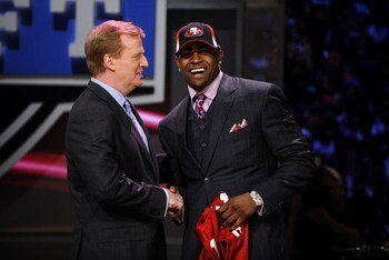 NEW YORK - APRIL 25:  NFL Commissioner Roger Goodell poses with with San Francisco 49ers #10 draft pick Michael Crabtree at Radio City Music Hall for the 2009 NFL Draft on April 25, 2009 in New York City  (Photo by Jeff Zelevansky/Getty Images)