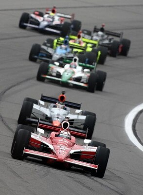 KANSAS CITY, KS - APRIL 26:  Scott Dixon drives his #9 Target Chip Ganassi Racing Dallara Honda ahead of a pack during for the IRL IndyCar Series Road Runner Turbo Indy 300 on April 26, 2009 at Kansas Speedway in Kansas City, Kansas.  (Photo by Jonathan F