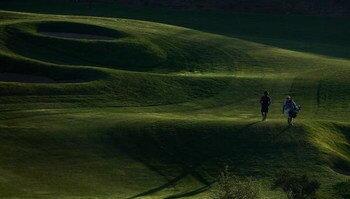 MORELIA, MEXICO- APRIL 24:  Young-A Yang of South Korea walk up the 11h fairway during the second round of the Corona Championship at the Tres Marias Residential Golf Club on April 24, 2009 in Morelia, Michoacan, Mexico. (Photo by Donald Miralle/Getty Ima