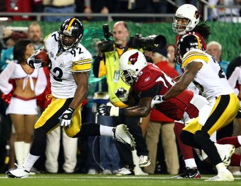 TAMPA, FL - FEBRUARY 01:  James Harrison #92 of the Pittsburgh Steelers scores a 100-yard interception for a touchdown in the second quarter against the Arizona Cardinals during Super Bowl XLIII on February 1, 2009 at Raymond James Stadium in Tampa, Flori