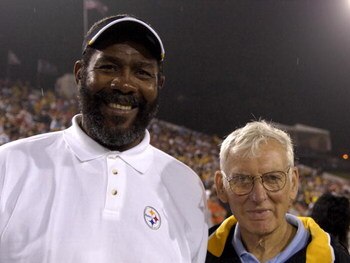 CANTON, OH - AUGUST 5:  Joe Greene and owner Dan Rooney of the Pittsburgh Steelers pose on the field during the AFC-NFC Pro Football Hall of Fame Game against the New Orleans Saints at Fawcett Stadium August 5, 2007 in Canton, Ohio.  (Photo by Al Messersc