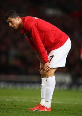 MANCHESTER, ENGLAND - APRIL 29:  Cristiano Ronaldo of Manchester United reacts to a missed chance during the UEFA Champions League Semi Final First Leg match between Manchester United and Arsenal at Old Trafford on April 29, 2009 in Manchester, England.  
