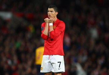 MANCHESTER, ENGLAND - APRIL 29:  Cristiano Ronaldo of Manchester United reacts to a missed chance during the UEFA Champions League Semi Final First Leg match between Manchester United and Arsenal at Old Trafford on April 29, 2009 in Manchester, England.  