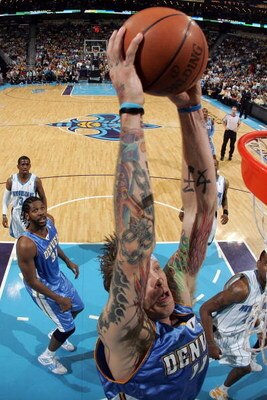 NEW ORLEANS - APRIL 27:  Chis Andersen #11 of the Denver Nuggets dunks the ball against the New Orleans Hornets in Game Four of the Western Conference Quarterfinals during the 2009 NBA Playoffs at New Orleans Arena on April 27, 2009 in New Orleans, Louisi