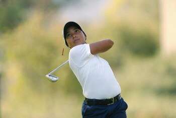 SAN DIEGO - July 17:  Cheyenne Woods, niece of Tiger Woods, tees off the 8th hole during the 2nd Round of the Junior World Golf Championships on July 17, 2002 at the Lawrence Welk Resort in San Diego, California.  (Photo by Dolanld Miralle/Getty Images)