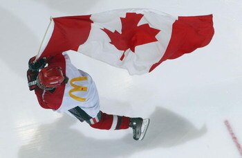 LONDON,ON - JANUARY 3:  Canadian Flag ceremony skater prior to start of game against Team USA on January 3, 2008 at the John Labatt Centre in London, Ontario. Team USA defeated Team Pacific 3-2 and earned a spot in the gold medal game against Team Ontario
