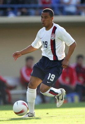SAN JOSE, CA - JUNE 2:  Charlie Davies #19 of the United States dribbles the ball through midfield against China during an international friendly match at Spartan Stadium on June 2, 2007 in San Jose, California. The USA defeated China 4-1. (Photo by Jed J