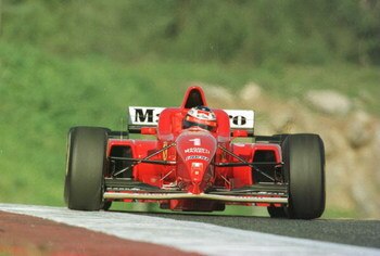 23 Feb 1996:   Formula One World Champion Michael Schmacher in action in the new Ferrari during pre-season testing at Estoril in Portugal. Mandatory Credit: Mike Cooper/Allsport