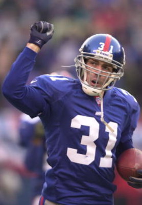 14 Jan 2001: Jason Sehorn #31 of New York Giants celebrates  after making an interception in the endzone during the NFC Championship Game against the Minnesota Vikings at Giant Stadium in East Rutherford, New Jersey. New York Giants won 41-0. <Digital Fil