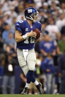 IRVING, TX - DECEMBER 14:  Quarterback Eli Manning #10 of the New York Giants drops back with the ball during the game against the Dallas Cowboys at Texas Stadium on December 14, 2008 in Irving, Texas. (Photo by Ronald Martinez/Getty Images)