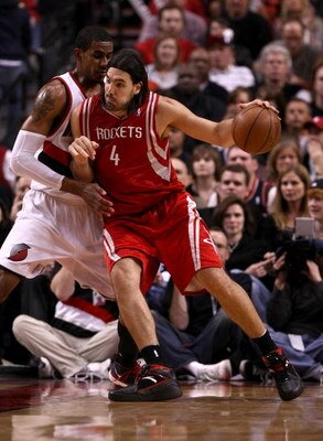 PORTLAND, OR - APRIL 28:  LaMarcus Aldridge #12 of the Portland Trail Blazers defends Luis Scola #4 of the Houston Rockets during Game 5 of the Western Conference Quarterfinals of the NBA Playoffs on April 28, 2009 at the Rose Garden in Portland, Oregon. 
