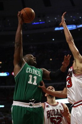 CHICAGO - APRIL 23: Glen Davis #11 of the Boston Celtics puts up a shot over Joakim Noah #13 of the Chicago Bulls in Game Three of the Eastern Conference Quarterfinals during the 2009 NBA Playoffs at the United Center on April 23, 2009 in Chicago, Illinoi