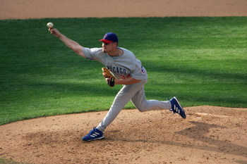 DENVER - AUGUST 19:  Kerry Wood #34 of the Chicago Cubs pitches during the game with the Colorado Rockies at Coors Field on August 19, 2005 in Denver, Colorado.  The Chicago Cubs defeated the Colorado Rockies 5-3.  (Photo by Doug Pensinger/Getty Images)