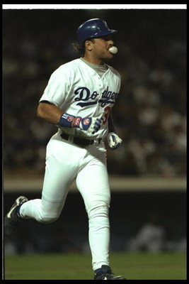 23 Apr 1997:  Mike Piazza of the Los Angeles Dodgers blows a bubble while running to first base during the Dodgers 2-1 win over the St. Louis Cardinals at Dodger Stadium in Los Angeles, California. Mandatory Credit: Elsa Hasch  /Allsport