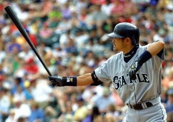 8 Apr 2001:  Seattle Mariners #51 Ichiro Suzuki sticks his bat out before taking a pitch against the Texas Rangers at the Ballpark in Arlington, Texas.  DIGITAL IMAGE Mandatory Credit: Ronald Martinez/ALLSPORT