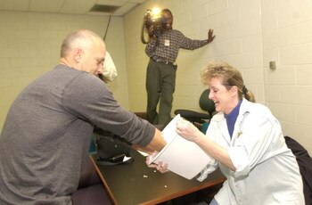 17 Apr 2000:  Cal Ripken Jr. of the Baltimore Orioles has his hands casted by Alex Flanagan to commemorate his 3000th career hit after a press conference at Oriole Park at Camden Yards in Baltimore, Maryland. <<DIGITAL IMAGE>> Mandatory Credit: Doug Pensi