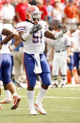 OXFORD, MS - SEPTEMBER 22: Brandon Spikes #51 of the Florida Gators reacts after a play against the Mississippi Rebels on September 22, 2007 at Vaught-Hemingway Stadium/Hollingsworth Field in Oxford, Mississippi. Florida won  30-24. (Photo by Joe Murphy/G