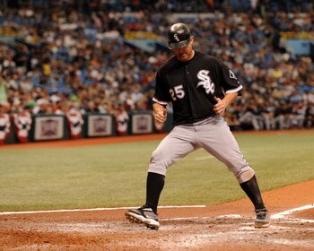 ST. PETERSBURG, FL - APRIL 19: Designated hitter Jim Thome #25  of the Chicago White Sox scores a run against the Tampa Bay Rays April 19, 2009 at Tropicana Field in St. Petersburg, Florida.  (Photo by Al Messerschmidt/Getty Images)