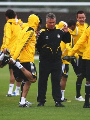 COBHAM, UNITED KINGDOM - APRIL 27:  Guus Hiddink, manager of Chelsea, speaks to his players during the Chelsea Training session at the Chelsea Training Ground on April 27, 2009 in Cobham, England.  (Photo by Ryan Pierse/Getty Images)