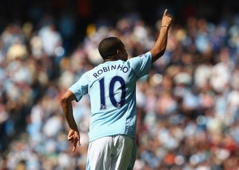 MANCHESTER, ENGLAND - APRIL 19:  Robinho of Manchester City celebrates scoring the opening goal during the Barclays Premier League match between Manchester City and West Bromwich Albion at the City of Manchester Stadium on April 19, 2009 in Manchester, En