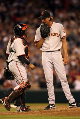 SEATTLE - MAY 22:  Randy Johnson #51 of the San Francisco Giants talks to teammate Bengie Molina #1 at the mound during the game against the Seattle Mariners on May 22, 2009 in Seattle, Washington. The Mariners defeated the Giants 2-1 in twelve innings. (