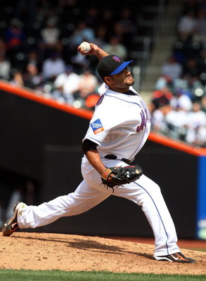 NEW YORK - APRIL 29: Johan Santana #57 of the New York Mets delivers a pitch against the Florida Marlins on April 29, 2009 at Citi Field in the Flushing neighborhood of the Queens borough of New York City. The Marlins defeated the Mets 4-3. (Photo by Ji