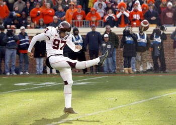 CHARLOTTESVILLE, VA - NOVEMBER 24: Brent Bowden #97 of the Virginia Tech Hokies punts during the game against the Virginia Cavaliers at Scott Stadium on November 24, 2007 in Charlottesville, Virginia. Virginia Tech defeated Virginia 33-21. (Photo by Kevin