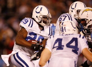 SAN DIEGO - JANUARY 03:  Running back Joseph Addai #29 of the Indianapolis Colts rushes against the San Diego Chargers during their AFC Wild Card Game on January 3, 2009 at Qualcomm Stadium in San Diego, California.  (Photo by Harry How/Getty Images)