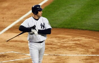 NEW YORK - MAY 05:  Mark Teixeira #25 of the New York Yankees walks back to the dugout after striking out against the Boston Red Sox on May 5, 2009 at Yankee Stadium in the Bronx borough of New York City. The Red Sox defeated the Yankees 7-3. (Photo by Ji