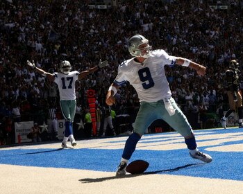 DALLAS - SEPTEMBER 30:  Quarterback Tony Romo #9 and wide receiver Sam Hurd #17 of the Dallas Cowboys celebrate after Romo's 15 yard touchdown run against the St. Louis Rams at Texas Stadium September 30, 2007 in Irving, Texas. The Cowboys won 35-7.  (Pho