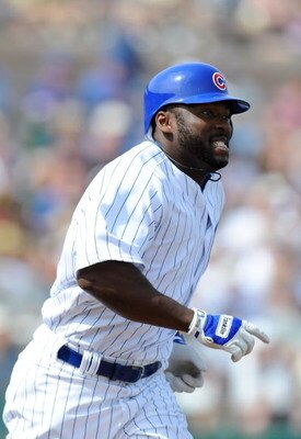 MESA, AZ - MARCH 06:  Milton Bradley #21 of the Chicago Cubs runs to first base during a Spring Training game against the Los Angeles Dodgers at HoHoKam Park on March 6, 2009 in Mesa, Arizona.  (Photo by Lisa Blumenfeld/Getty Images)