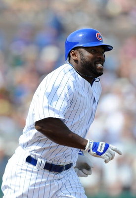 MESA, AZ - MARCH 06: Milton Bradley #21 of the Chicago Cubs runs to first base during a Spring Training game against the Los Angeles Dodgers at HoHoKam Park on March 6, 2009 in Mesa, Arizona. (Photo by Lisa Blumenfeld/Getty Images)
