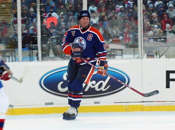 EDMONTON, CANADA - NOVEMBER 22:  Wayne Gretzky #99 of the Edmonton Oilers watches the play from the wing against the Montreal Canadiens during the Molson Canadien Heritage Classic on November 22, 2003 at Commonwealth Stadium in Edmonton, Canada. The Oiler