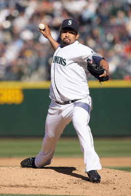SEATTLE - APRIL 14: Carlos Silva #52 of the Seattle Mariners delivers the pitch against the Los Angeles Angels of Anaheim during the Opening Day game on April 14, 2009 at Safeco Field in Seattle, Washington. (Photo by: Otto Greule Jr/Getty Images)