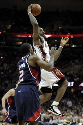CLEVELAND - MAY 07:  LeBron James #23 of the Cleveland Cavaliers takes a shot over Joe Johnson #2 of the Atlanta Hawks during Game Two of the Eastern Conference Semifinals during the 2009 NBA Playoffs at Quicken Loans Arena on May 7, 2009 in Cleveland, Oh