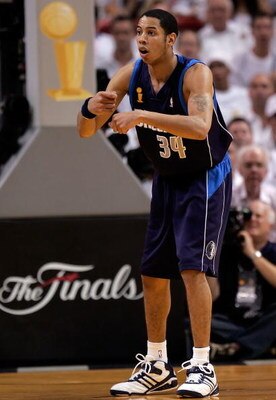 MIAMI - JUNE 18:  Devin Harris #34 of the Dallas Mavericks wants a travel called in game five of the 2006 NBA Finals against the Miami Heat on June 18, 2006 at American Airlines Arena in Miami, Florida. The Heat defeated the Mavericks 101-100 in overtime 