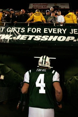 EAST RUTHERFORD, NJ - DECEMBER 28: Brett Favre #4 of The New York Jets leaves the field after losing to The Miami Dolphins 24-17 after their game on December 28, 2008 at Giants Stadium in East Rutherford, New Jersey. (Photo by Al Bello/Getty Images)