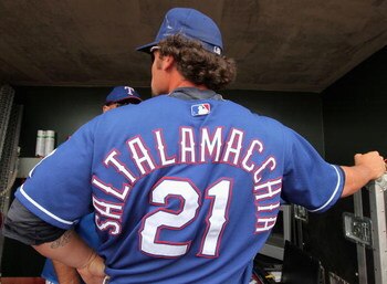 SURPRISE, AZ - MARCH 05:  Jarrod Saltalamacchia #21 of the Texas Rangers stands in the dugout during the spring training game against the San Diego Padres at Surprise Stadium on March 5, 2009 in Surprise, Arizona. The Rangers defeated the Padres 4-3.  (Ph
