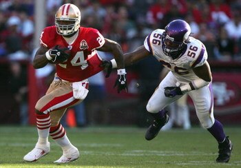 SAN FRANCISCO - NOVEMBER 05:  Michael Robinson #24 of the San Francisco 49ers runs with the ball against E.J. Henderson #56 of the Minnesota Vikings during an NFL game at Monster Park on November 5, 2006 in San Francisco, California.  (Photo by Jed Jacobs