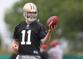 SANTA CLARA, CA - MAY 01:  Quarterback Alex Smith #11 of the San Francisco 49ers looks on during the 49ers Minicamp at their training facilities on May 1, 2009 in Santa Clara, California.  (Photo by Jed Jacobsohn/Getty Images)