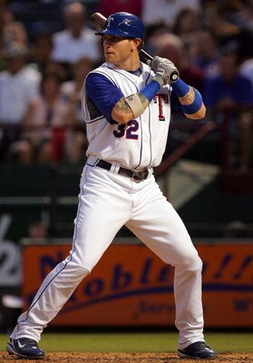 ARLINGTON, TX - AUGUST 24:  Josh Hamilton #32 of the Texas Rangers at bat against the Cleveland Indians on August 24, 2008 at Rangers Ballpark in Arlington, Texas.  (Photo by Ronald Martinez/Getty Images)