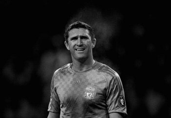 EINDHOVEN, NETHERLANDS - DECEMBER 09: (EDITORS NOTE: THIS IMAGE HAS BEEN CONVERTED TO BLACK AND WHITE)  Robbie Keane of Liverpool looks on during the UEFA Champions League Group D match between PSV Eindhoven and Liverpool at the Philips Stadium on Decembe