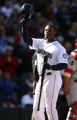 SEATTLE - APRIL 14:  Ken Griffey Jr. #24 of the Seattle Mariners acknowledges the crowd during his first at-bat against the Los Angeles Angels of Anaheim during the Opening Day game on April 14, 2009 at Safeco Field in Seattle, Washington. (Photo by Otto 