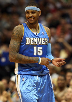 DALLAS - MAY 09: Forward Carmelo Anthony #15 of the Denver Nuggets smiles during play against the Dallas Mavericks in Game Three of the Western Conference Semifinals during the 2009 NBA Playoffs at American Airlines Center on May 9, 2009 in Dallas, Texas