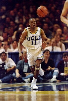 23 Mar 1995: Guard Tyus Edney of the UCLA Bruins moves the ball during a game against the Mississippi State Bulldogs. UCLA won the game, 86-67.