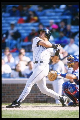 15 Apr 1997:  Third baseman Vinny Castilla of the Colorado Rockies swings at the ball during a game against the Chicago Cubs at Wrigley Field in Chicago, Illinois.  The Rockies won the game 10-7. Mandatory Credit: Jonathan Daniel  /Allsport